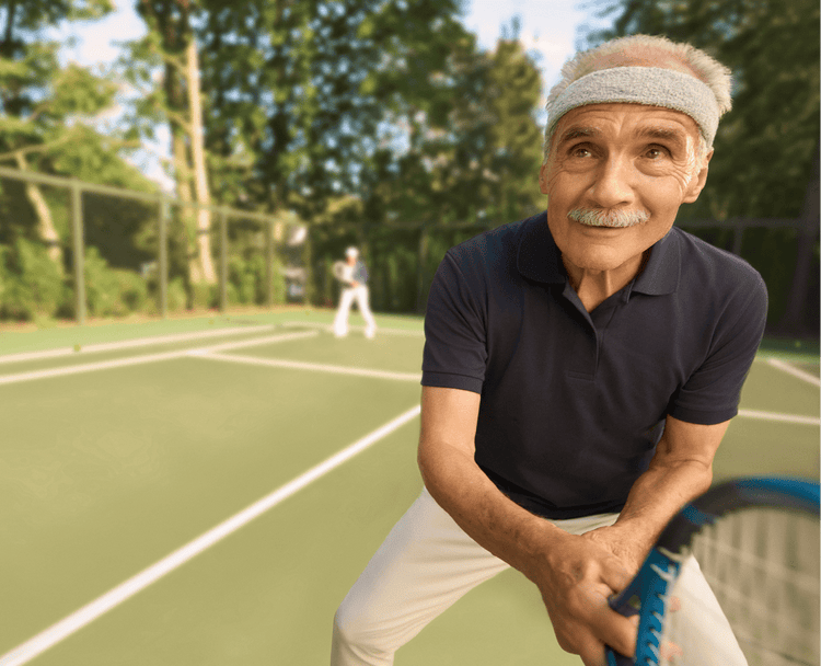 Older adult playing tennis