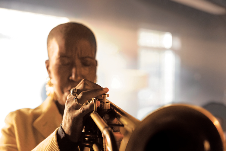 Woman playing trumpet