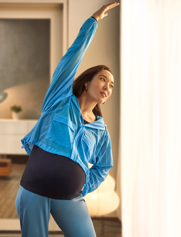 Pregnant woman stretching